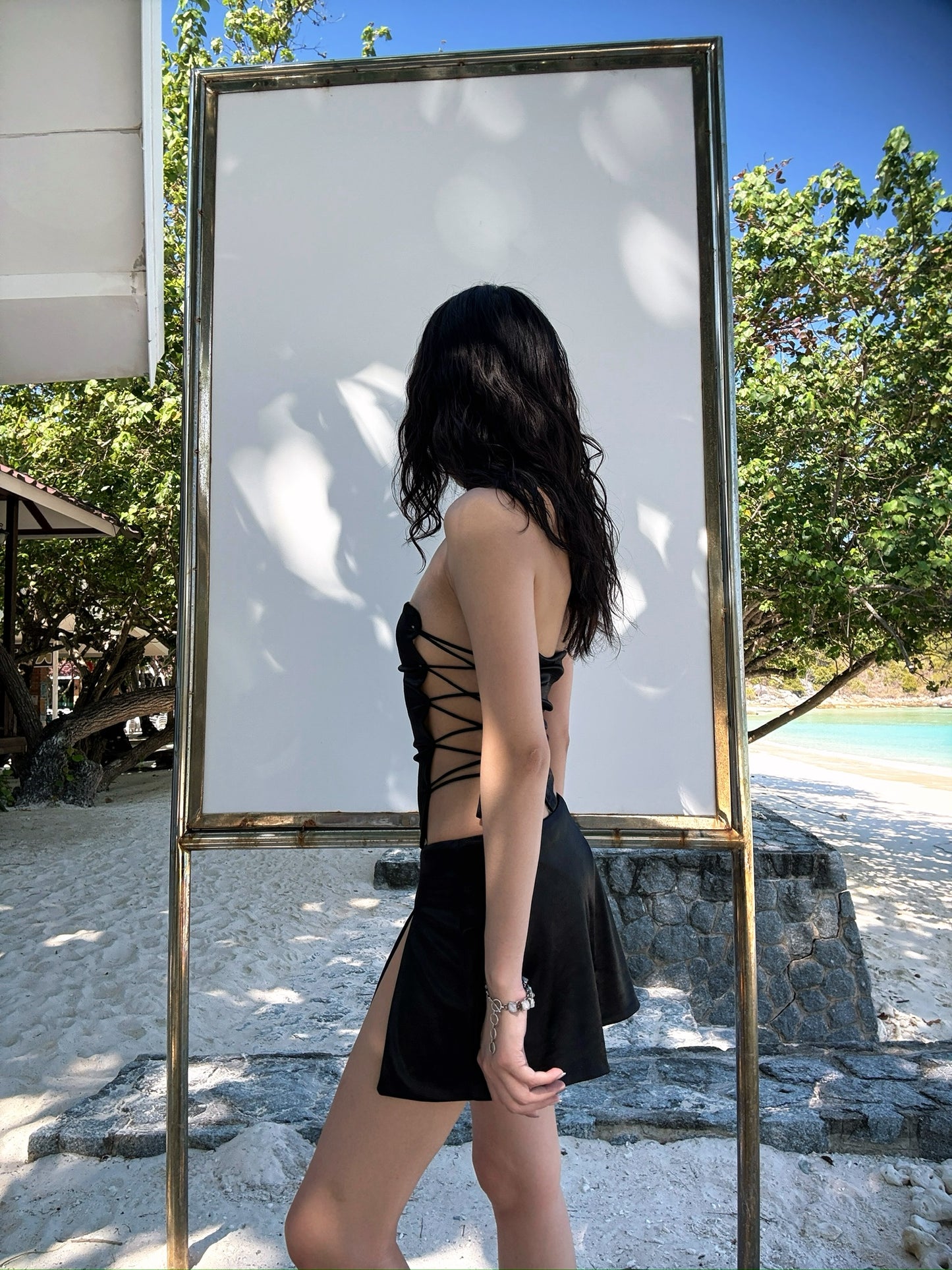 Black minimalist strapless bikini set (available for separate purchase)