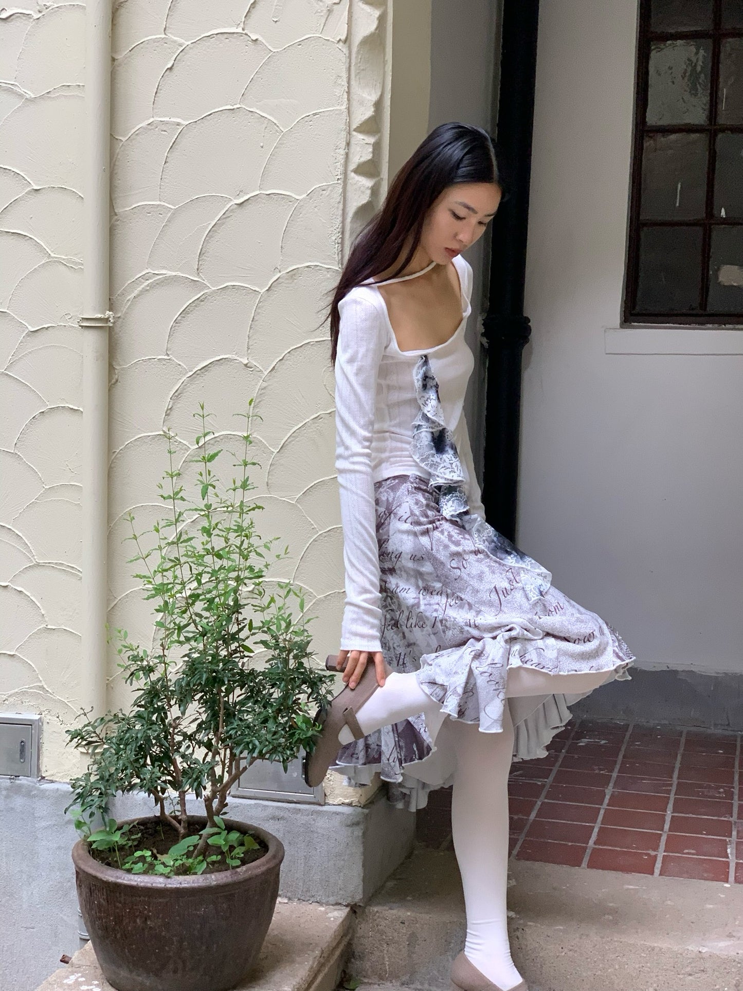 Ballerina white lace long-sleeved top with large round neckline