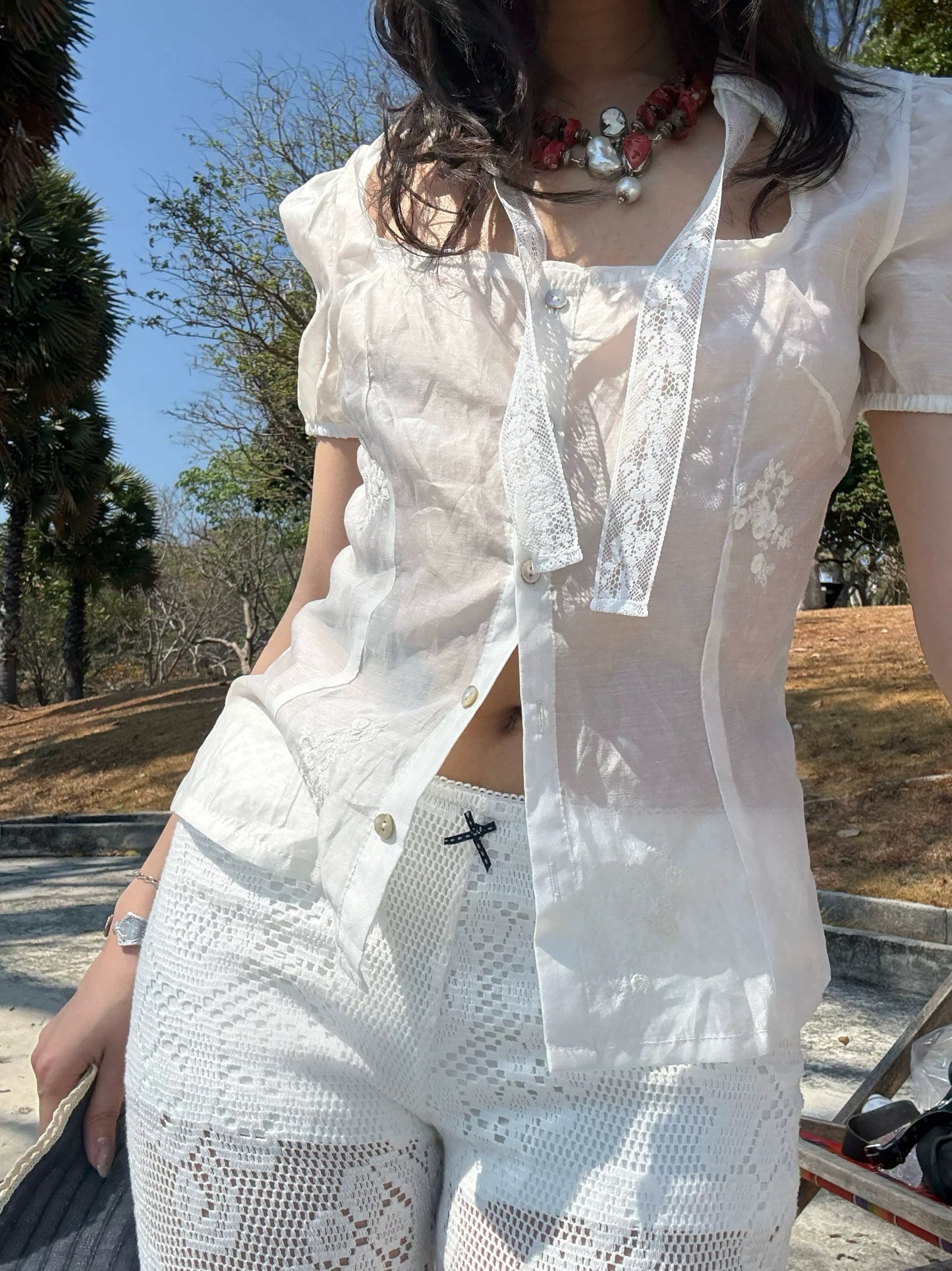 Bubble cutie sheer light-catching short-sleeved blouse