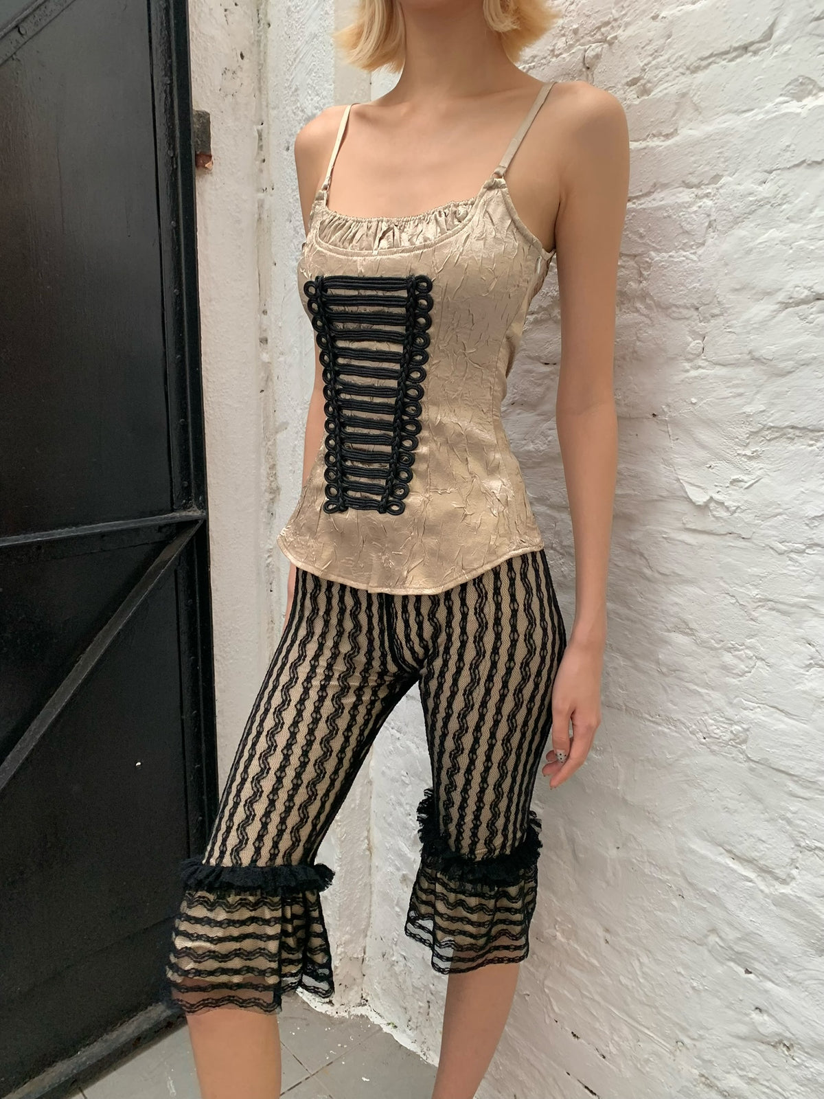 Napoleon-style golden halter top