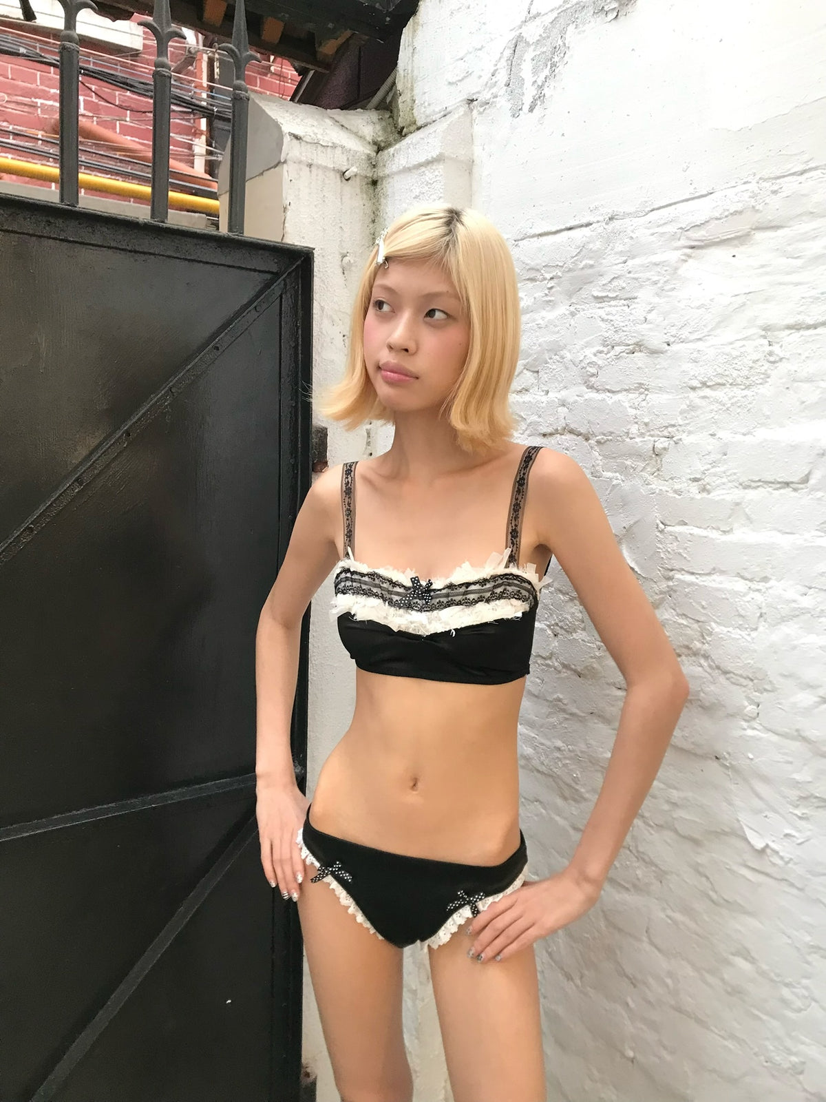 Black and white lace trimmed playful bikini set