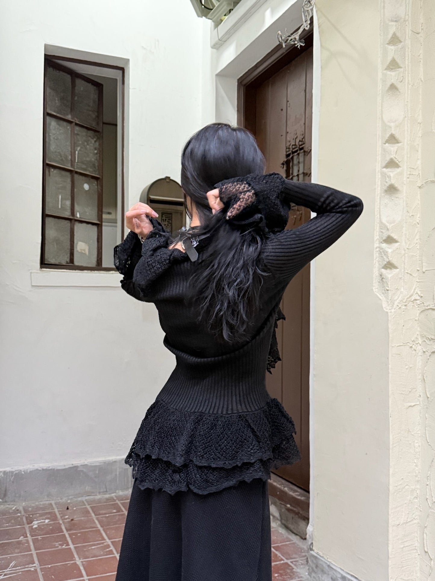 Black slim knit long sleeve top cardigan with ruffled edge