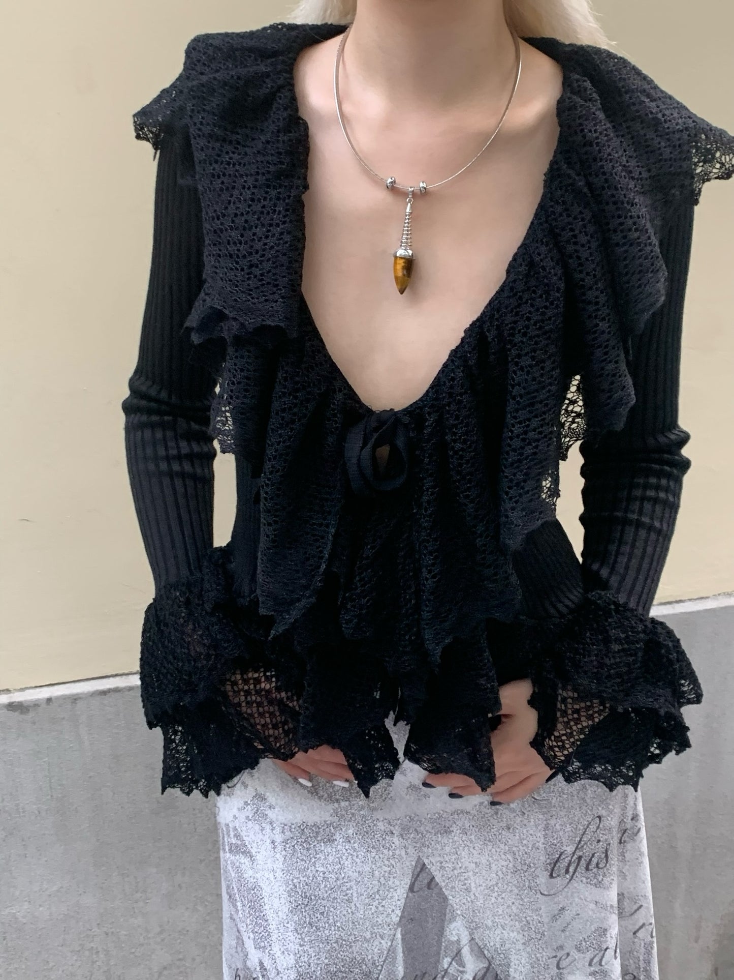 Black slim knit long sleeve top cardigan with ruffled edge
