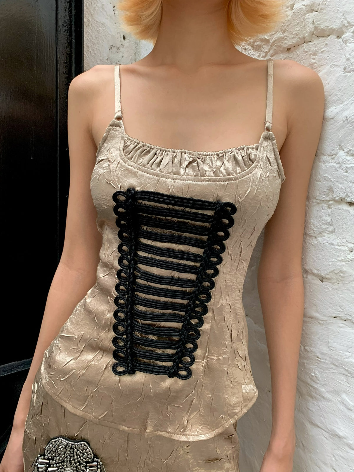Napoleon-style golden halter top