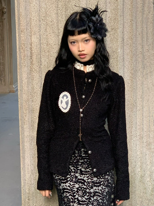 Black knitted woolen sweater / blouse