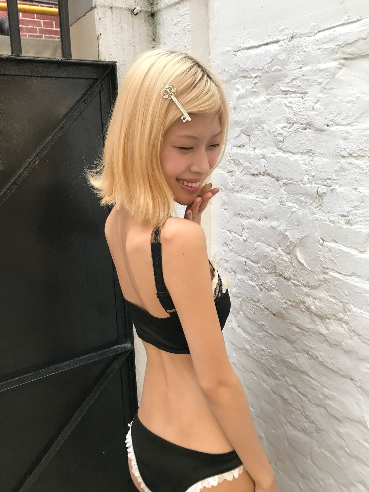 Black and white lace trimmed playful bikini set
