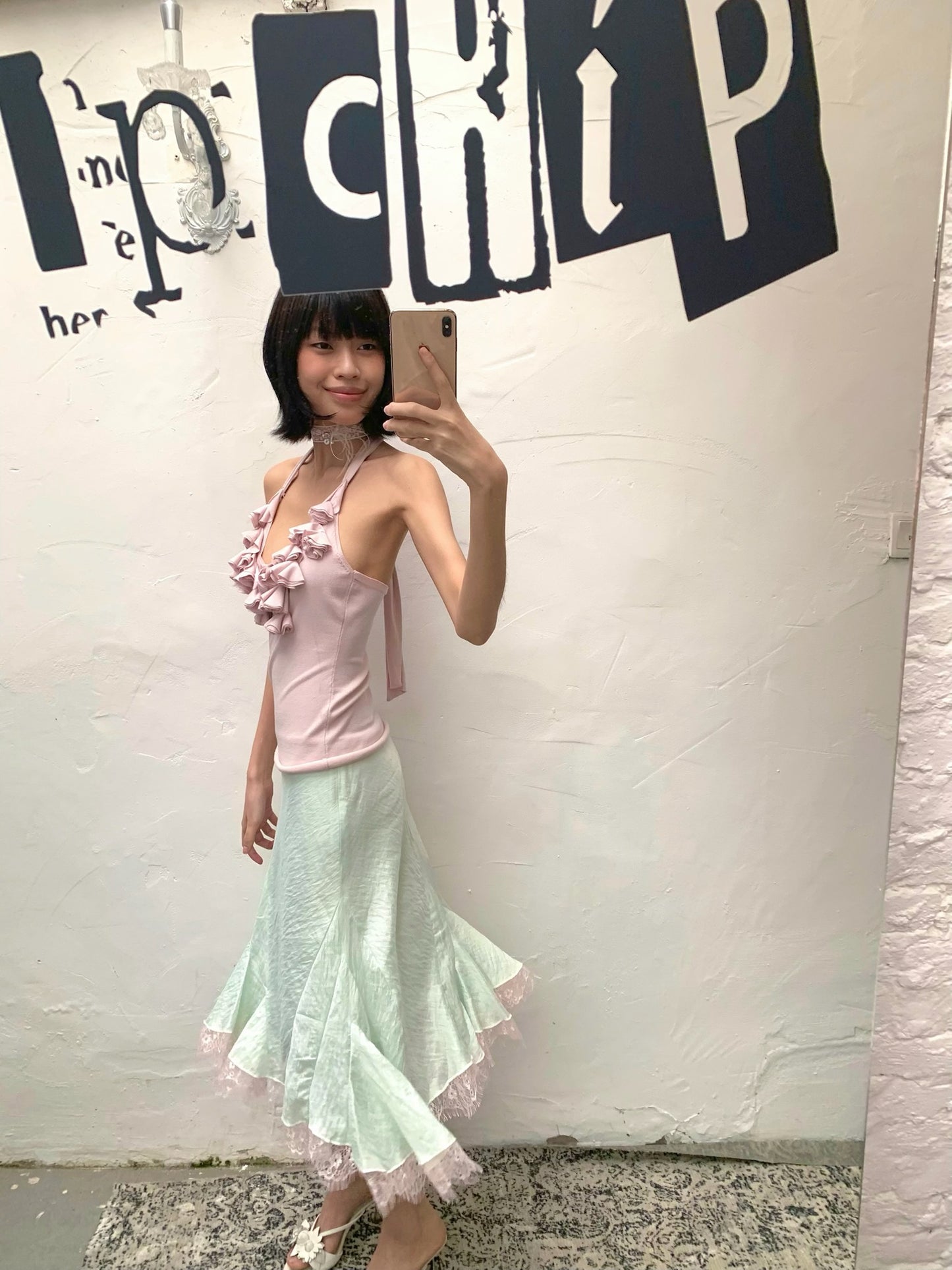 Mint green patched light pink lace flared chiffon skirt with a flowing hem