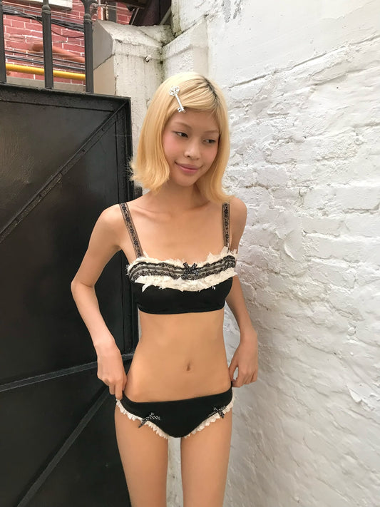 Black and white lace trimmed playful bikini set