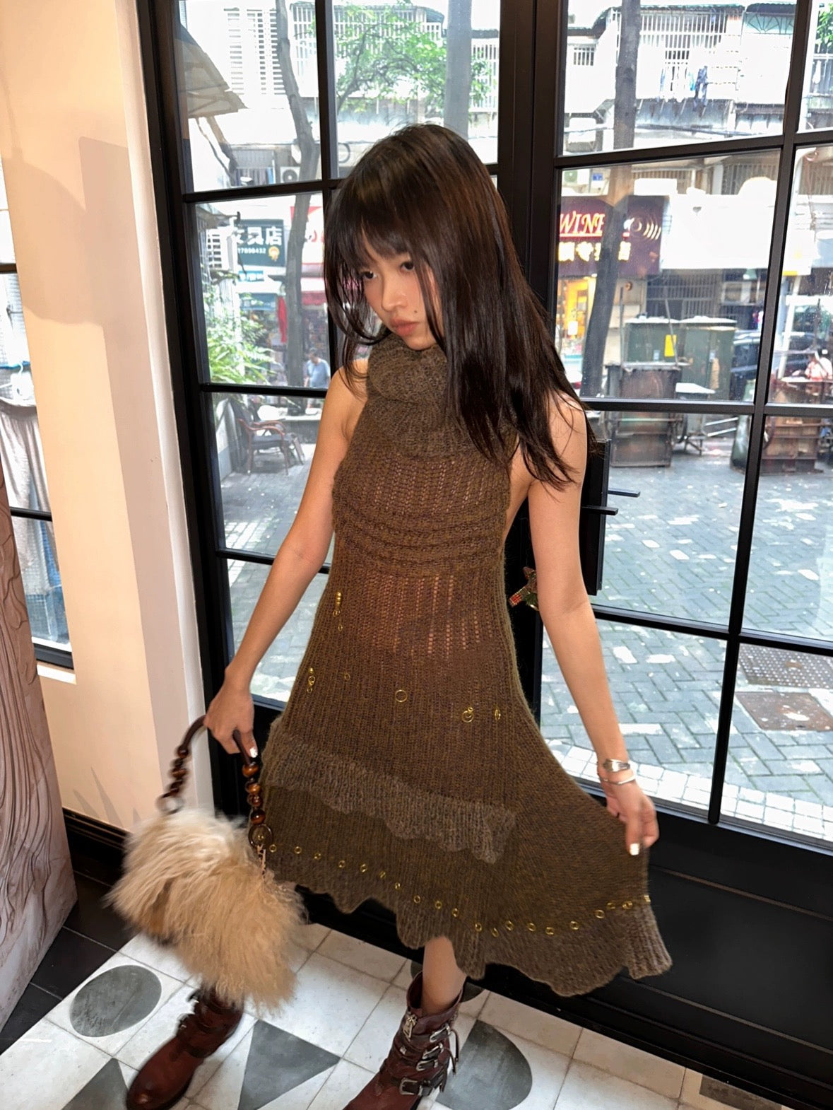 Dark green imported yarn wool blended knit dress with hand embroidered rings