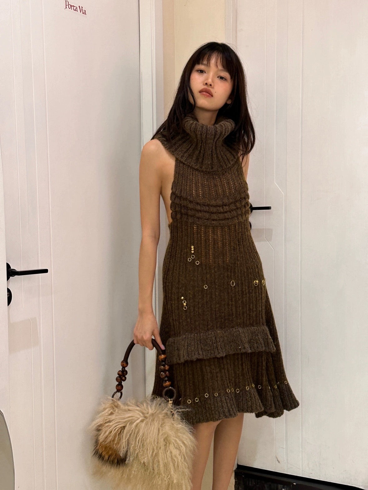 Dark green imported yarn wool blended knit dress with hand embroidered rings