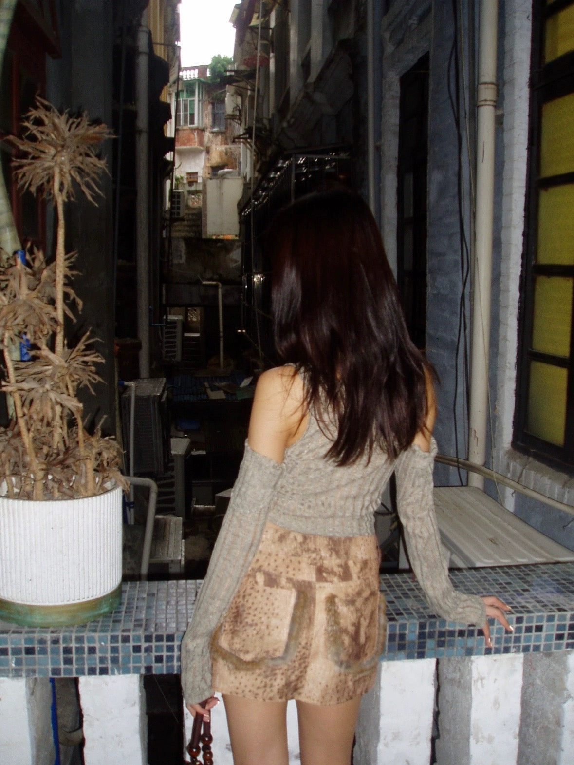 Asymmetric matcha green patched with gold plated velvet top
